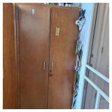 Cabinet 35 1/2 inches ï¿½ 71 1/2 , contents not