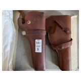 Two leather holsters