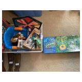 Tote of toys, dominos, booster seat, action