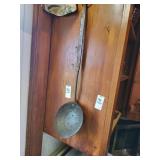 Early  metal strainer with hooked Handel vintage