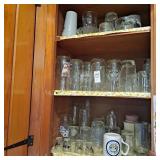 3 shelved of assorted glasses