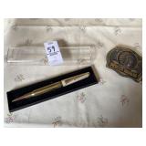 Redman belt buckle, bullet/rifle pen