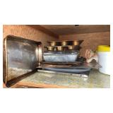 Shelf of Bake Pans and Mixing Bowls