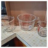 Two glass Pyrex measuring cups, 4 cup,2cup,1 cup