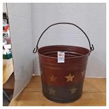 Primitive distressed metal bucket