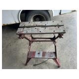 Miter saw stand with folding legs