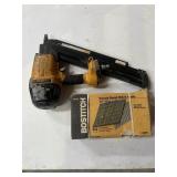 Bostitch pneumatic strip nail gun with box of nail