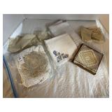 Assorted linen and crocheted doilies