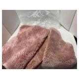 Two sets of peach colored bathroom rugs, 4 rugs