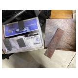 Three pieces of 12 x 12 ceramic tile, 12 pieces