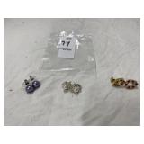 Three pairs of pierced earrings, costume jewelry