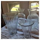 Four glass vases, 3 10 inches tall, 1 7 inches