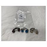 Three pairs of pierced earrings