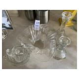 Two glass candlesticks, two small glass creamers,