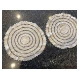 Six hand crocheted doilies