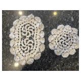 Eight hand crocheted doilies