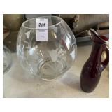Etched vase and red cruet