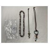 Three necklaces, two are Longaberger