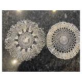 Eight hand crocheted doilies