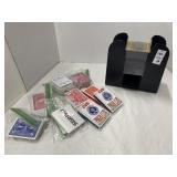 Battery powered card shuffler and nine decks of