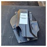 Fobus GL2 polymer paddle holster designed to hold