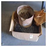 box filled with bulk steel fasteners, other nails