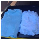 Three white valance curtains. Blue shower curtain