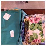 Various pieces of blue/green material