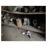 Shelf Lot of Alternators and Car Parts
