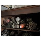Shelf Lot of Alternators and Car Parts