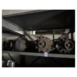 Shelf Lot of Alternators and Car Parts