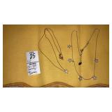 (2) CZ & 925 Sterling Star necklaces
