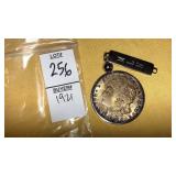 1921 Morgan silver dollar with fob frame