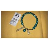 New- blue Pearl ï¿½Peaceï¿½ &ï¿½Doveï¿½ stretch bracelet
