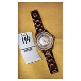Fossil rhinestone bezel copper style watch -