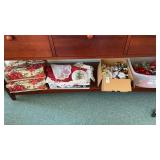Shelf of Christmas Related Decor and Placemats