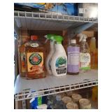 Shelf lot of cleaning supplies
