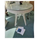 Wicker round table glass top 33in. X 30in. Tall