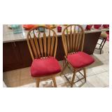 2 Swivel Bar Stools with Red Cushions