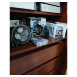 Shelf lot of misc. 3 camera cases, fan etc