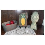 Metal Fruit Basin, Stone Pineapple Display, and