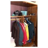 Lot of Clothing in Cabinet