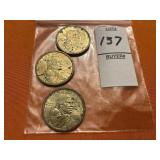 Three 2000 Sacagawea Dollar coins