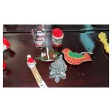 Assorted mini Christmas figurines and candle