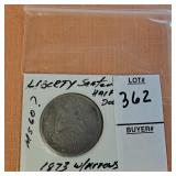 1873 Liberty Seated half dollar with arrows