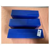 Three blue plastic storage boxes designed to hold