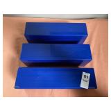 Three blue plastic storage boxes designed to hold