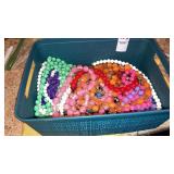 Bin of beaded necklaces