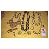 Grandma pin, chain necklaces, rings