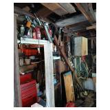 Items on wall and floor grease guns etc